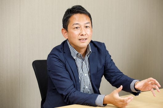 清長の営業部・日朝健一部長