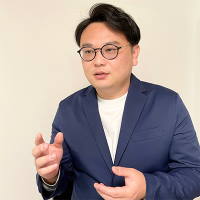 日本流通産業新聞社 取締役 第2編集部 部長 手塚 康輔氏