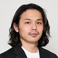 足立 謙二