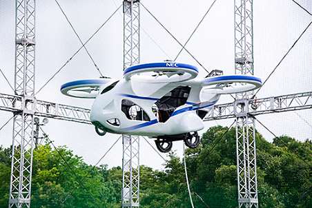 NECは「空飛ぶ車」の実用化に向けた試作機の浮上実験に成功したと発表